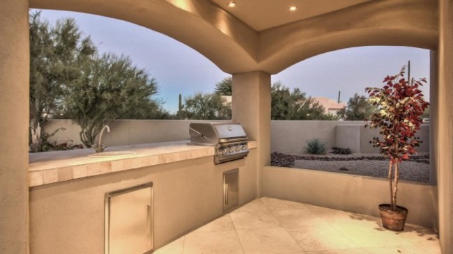 theres-a-built-in-grill-among-the-appliances-of-the-outdoor-kitchen