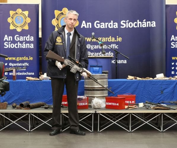 6/1/2016 Detective Garda Shay O Donnell holds a AK