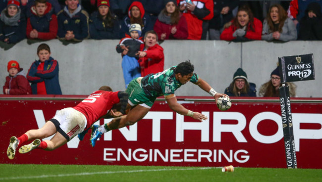 Bundee Aki scores his side's second try despite Andrew Conway