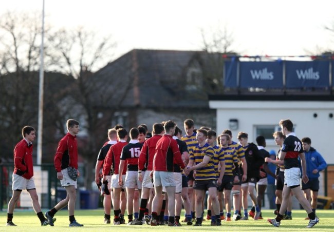 Both team shake hands after the game