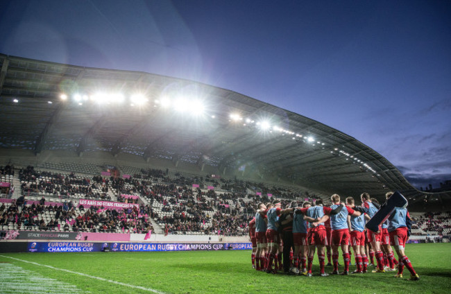 The Munster team huddle before the game