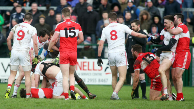 The two teams scuffle off the ball