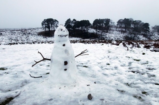 11/1/2016 A snowman stands at attention as the lig