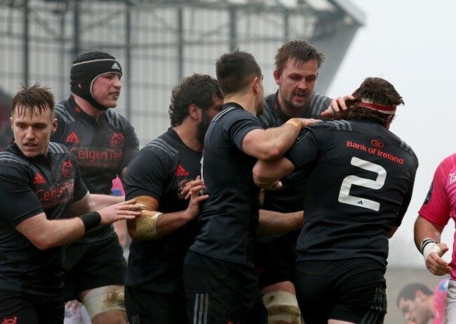 Mike Sherry celebrates with his teammates after scoring the first try