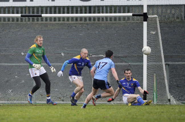 Barry Gilleran clears the ball from the goal line late in the game