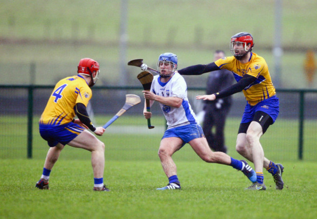 Brian Nolan in action against Darach Honan and Paul Flanagan