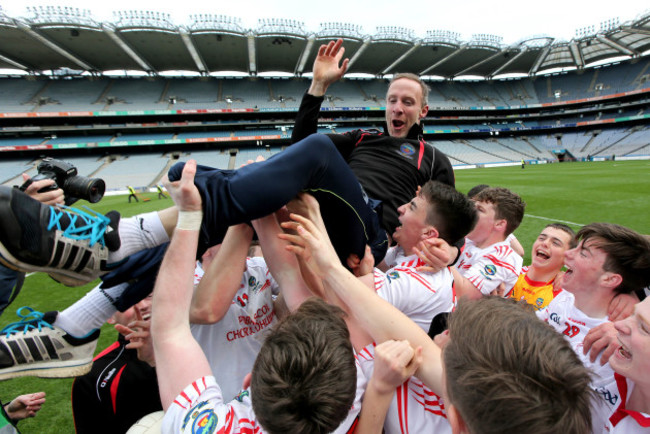 Tommy Griffin celebrates with his team after the game