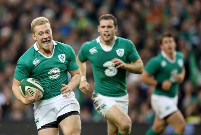 Stuart Olding runs in for a try