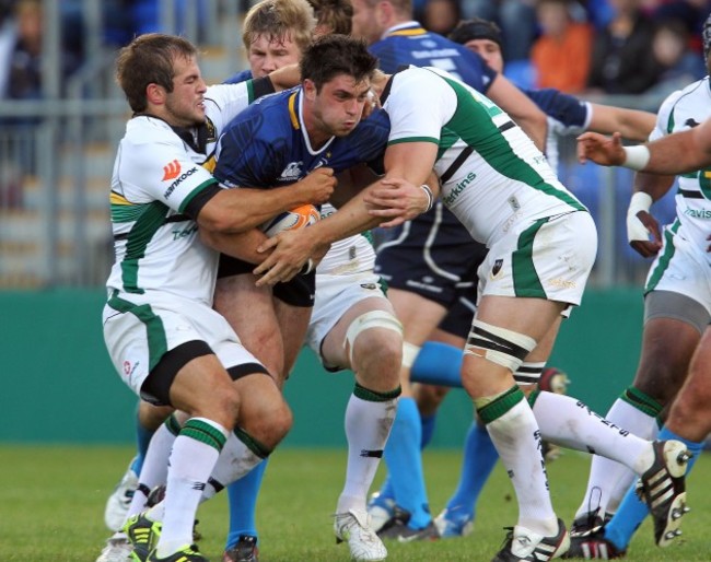 Eamonn Sheridan tackled by Stephen Myler and Ben Nutley