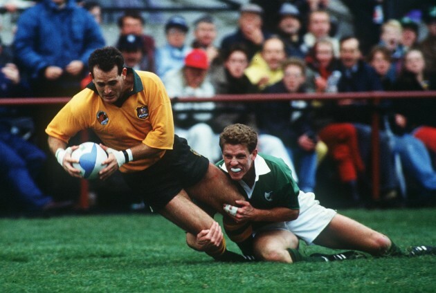 David Campese is tackled Brendan Mullin