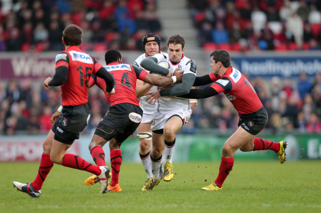 Jared Payne is tackled by Daniel Ikpefan and Guillaume Bousses