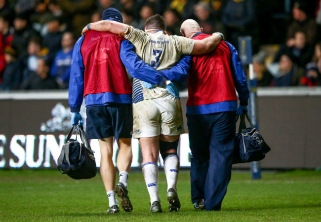 Martin Moore leaves the field injured