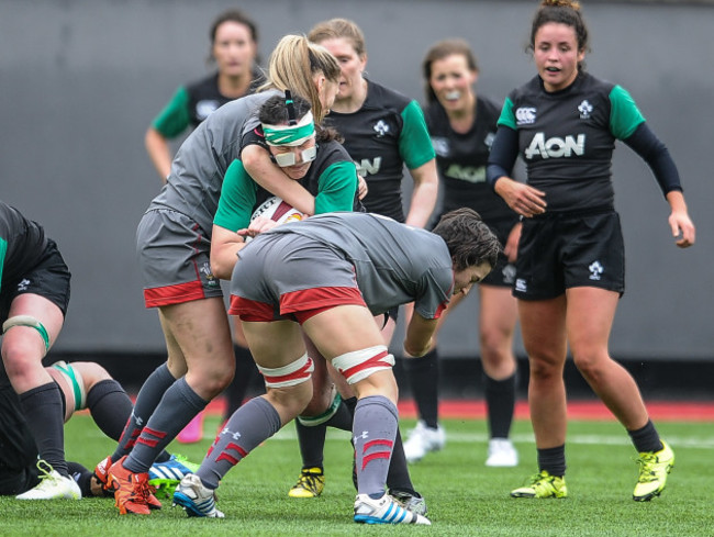 Paula Fitzpatrick is tackled by Adi Taviner and Melissa Clay