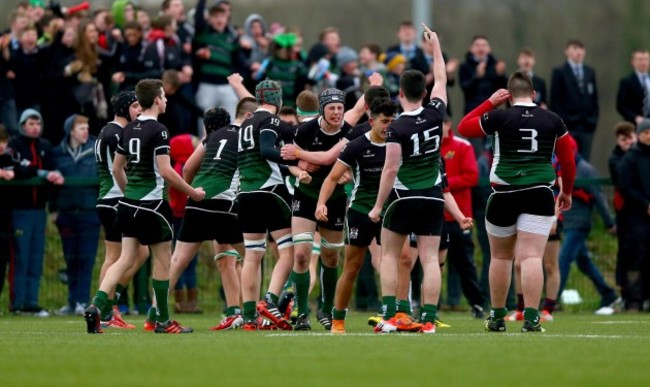 Bandon players celebrate at the final whistle