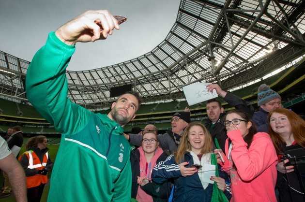 Conor Murray takes a selfie with fans