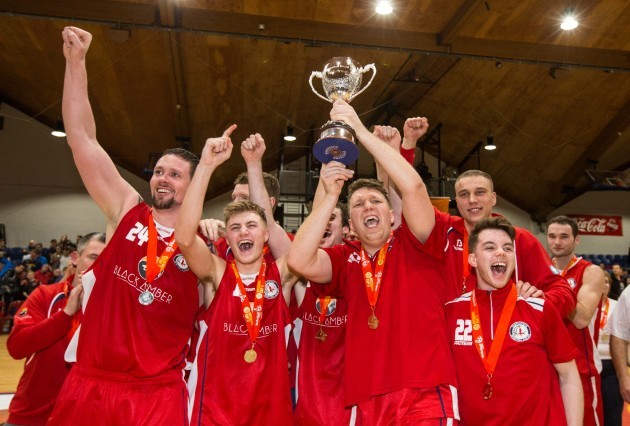 Shane Homan and Templeogue players celebrate with the cup
