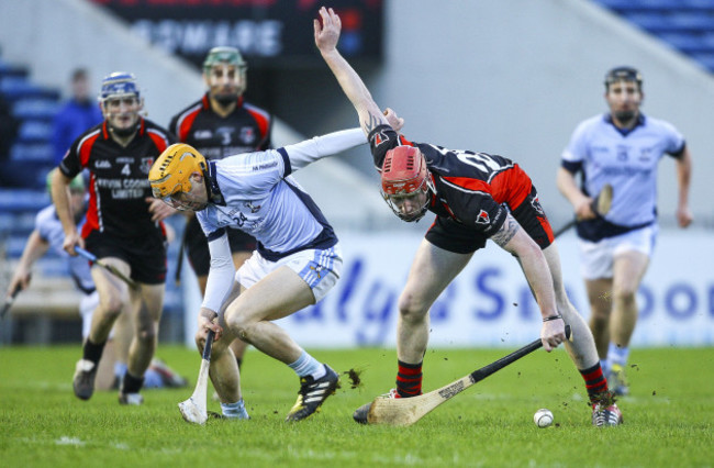 Anthony Roche in action against Na Piarsaigh's David Dempsey