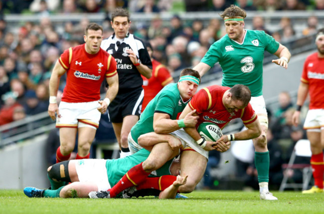 Devin Toner and CJ Stander tackle Jamie Roberts