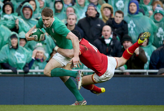 Andrew Trimble tackled by Tom James