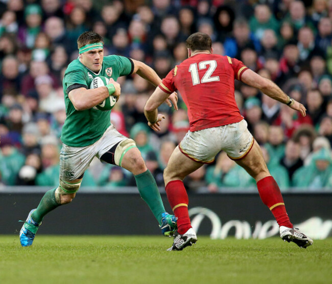 CJ Stander runs at Jamie Roberts