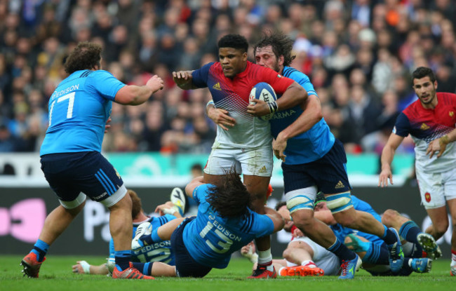 France’s Jonathan Danty is tackled by Italy’s Michele Campagnaro and Valerio Bernabo