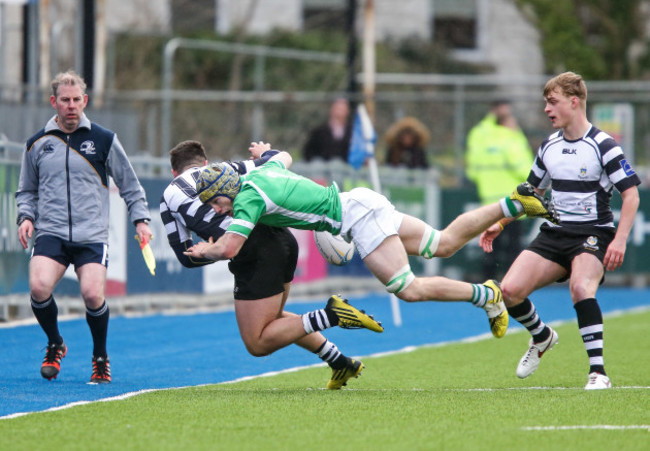 Jack MacNamara tackles Daniel Keane