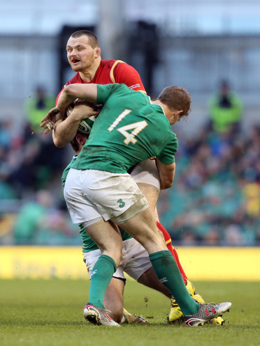Ken Owens is tackled by Andrew Trimble