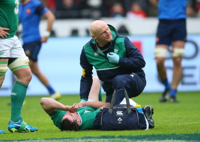 Jonathan Sexton down injured with Dr. Eanna Falvey