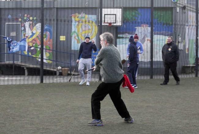 gerry adams playing hurling