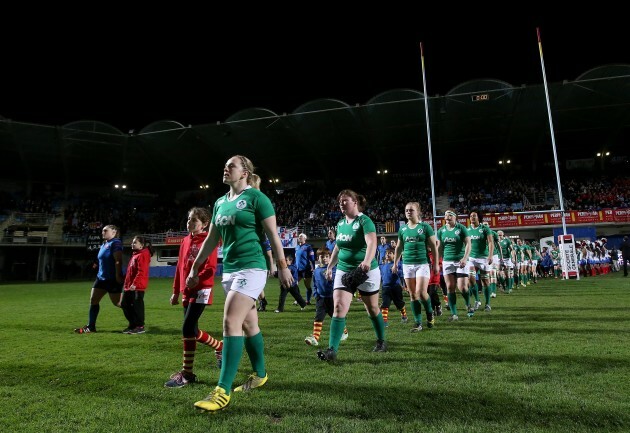 Niamh Briggs leads out her team