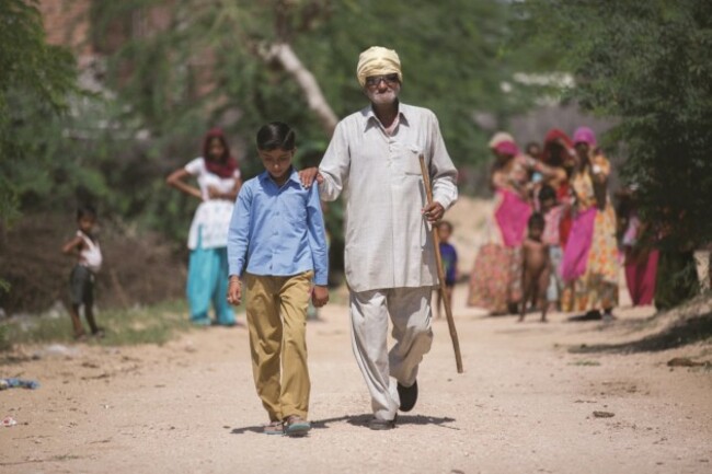 SEPT- 2014 -New Delhi -INDIA: Photographer Graeme Robertson traveled to India to photograph one of Sightsavers programs as part of his upcoming show in London. These pictures are from New Delhi as he travels though the city on route to his destination. 3rd December 2014 is International Day of Persons with Disabilities and one year on from the launch of the Put Us in the Picture campaign. Sightsavers wants to use this day to celebrate the success achieved to date, thank supporters and inspire, engage and motivate people to continue to put pressure on the government.  To date the main focus has been on the political process and audiences, but we now need to build on the public campaign, and the 13,000 supporters who have already signed up, to show decision makers that this is an issue people care about. By increasing public support, we can put pressure on politicians to ensure they carry out their promises. Coverage will provide an opportunity for me to connect with a wider public audience of politically aware readers in order to raise awareness of the issues and continue to build momentum and public support for the campaign. The content gathered on the trip and the accompanying TV crew (along with the exhibition on the 3rd of DEC in East london) will give people with disabilities an opportunity to tell their stories.  It will bring their stories to life through words, images and audio, so the public can experience what it?s like for people with disabilities living in developing countries and feel moved and inspired to support the cause.  Using the power of individual personal stories we will demonstrate the barriers people with disabilities in developing countries face and the impact this is having on their lives and those around them. We will also show the alternative side of the story - how it doesn?t have to be this way ? that there is huge potential to transform their lives and those of their families and wider community given the right interventions.  Portraits at home ( Photograph by Graeme Robertson)