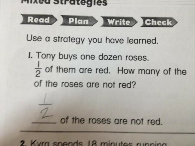 Grading 2nd grade math homework.