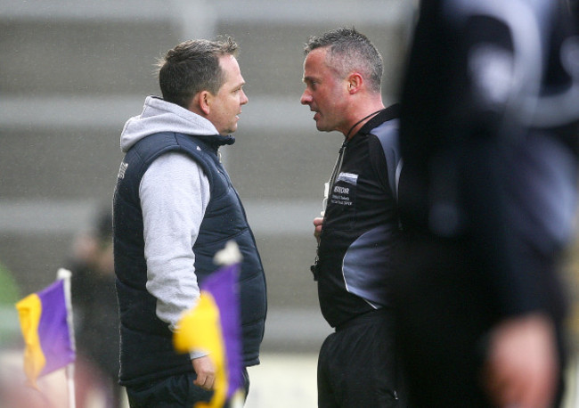 Davy Fitzgerald is spoken to by James McGrath