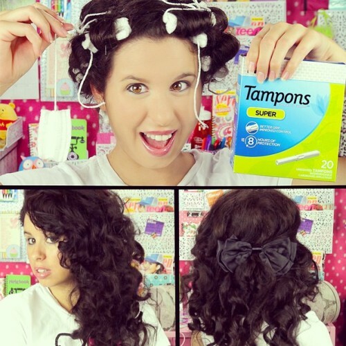 Women are curling their hair using tampons and maxi pads