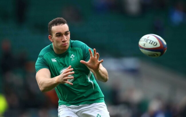 Ultan Dillane warms up before the match