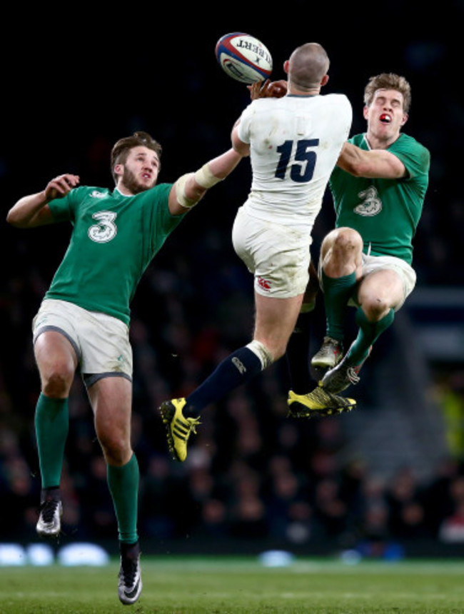 Stuart McCloskey and Andrew Trimble with Mike Brown