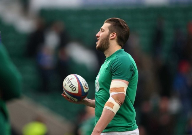 Stuart McCloskey warms up before the match