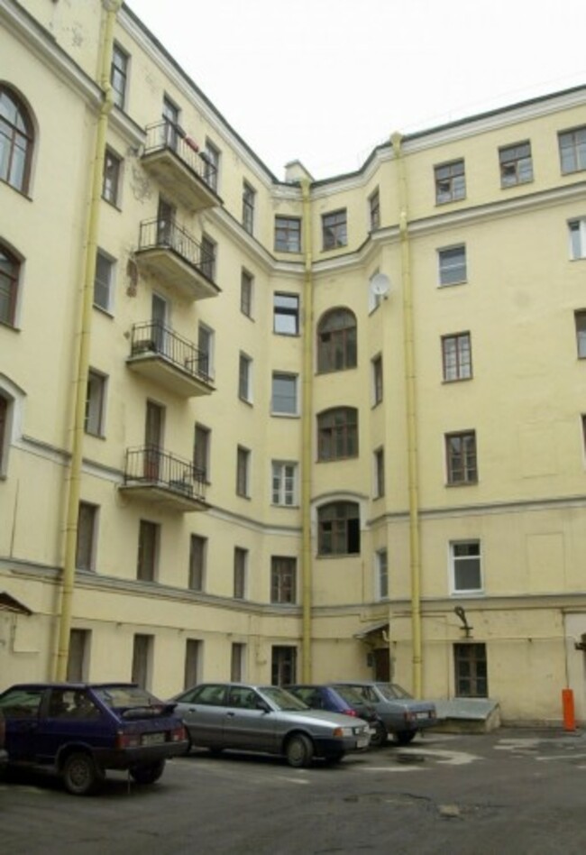 but-as-a-child-putin-lived-in-this-far-from-grand-apartment-block-in-st-petersburg-he-and-his-parents-lived-in-a-three-bedroom-communal-home-shared-by-three-families