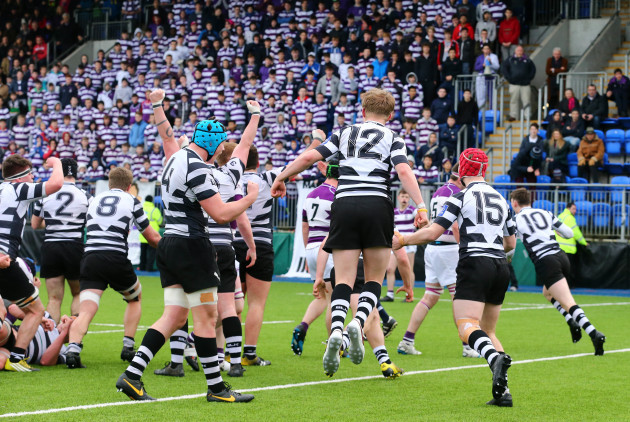 CC Roscrea players celebrate at the final whistle