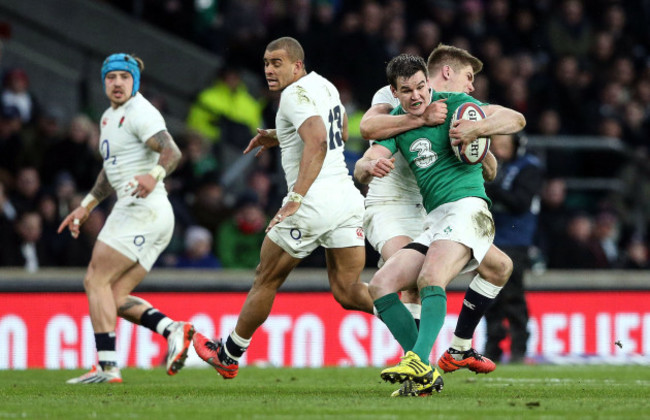 Owen Farrell tackles Jonathan Sexton