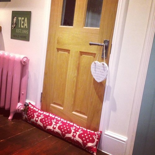 So here's the thing. We still don't have a Christmas tree but have opted for a completely unnecessary draught excluder. But with reindeer on it to make it more seasonal #iwillbuyanything #christmas #draughtexcluder #kitchen