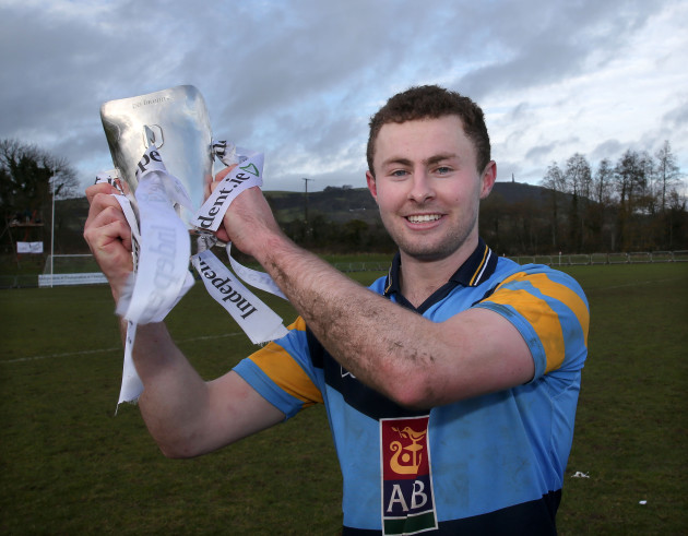 Jack McCaffrey celebrates with the Sigerson Cup