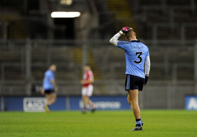 Jonny Cooper leaves the pitch after getting a red card