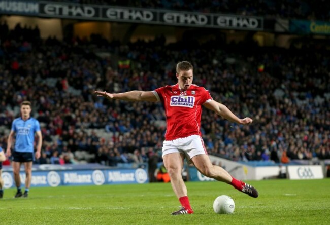 Colm O'Neill scores the first goal of the game with a penalty