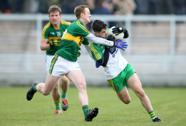 Colm Cooper tackles Ryan McHugh