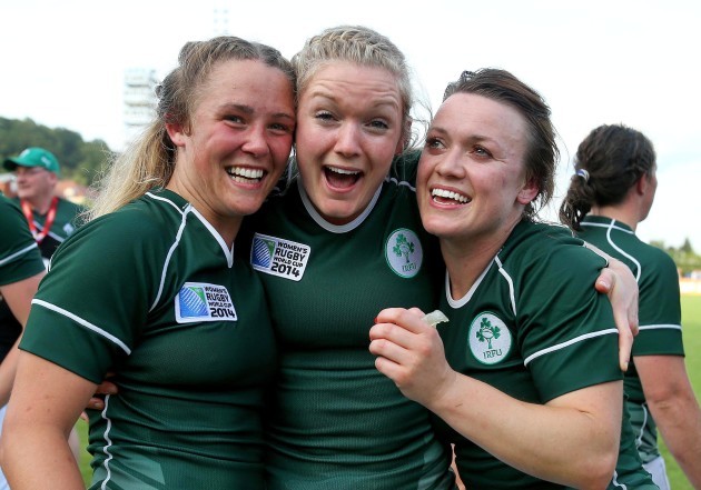 Ashleigh Baxter, Vikki McGinn and Lynne Cantwell celebrate after the game 5/8/2014
