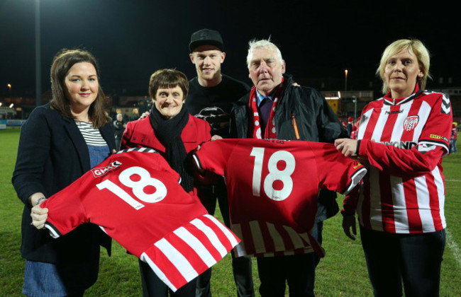 James McClean and Karen Pyne presenting the No 18 jersey to Terri-Louise Farren, Michael and Kathleen Farren