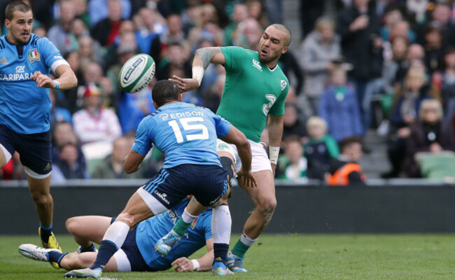 Simon Zebo offloads the ball