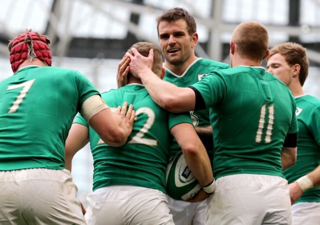 Ian Madigan celebraies his try with Josh van der Flier, Keith Earls and Jared Payne