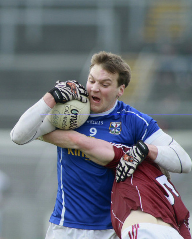 Gearoid McKiernan tackled by Paul Varley